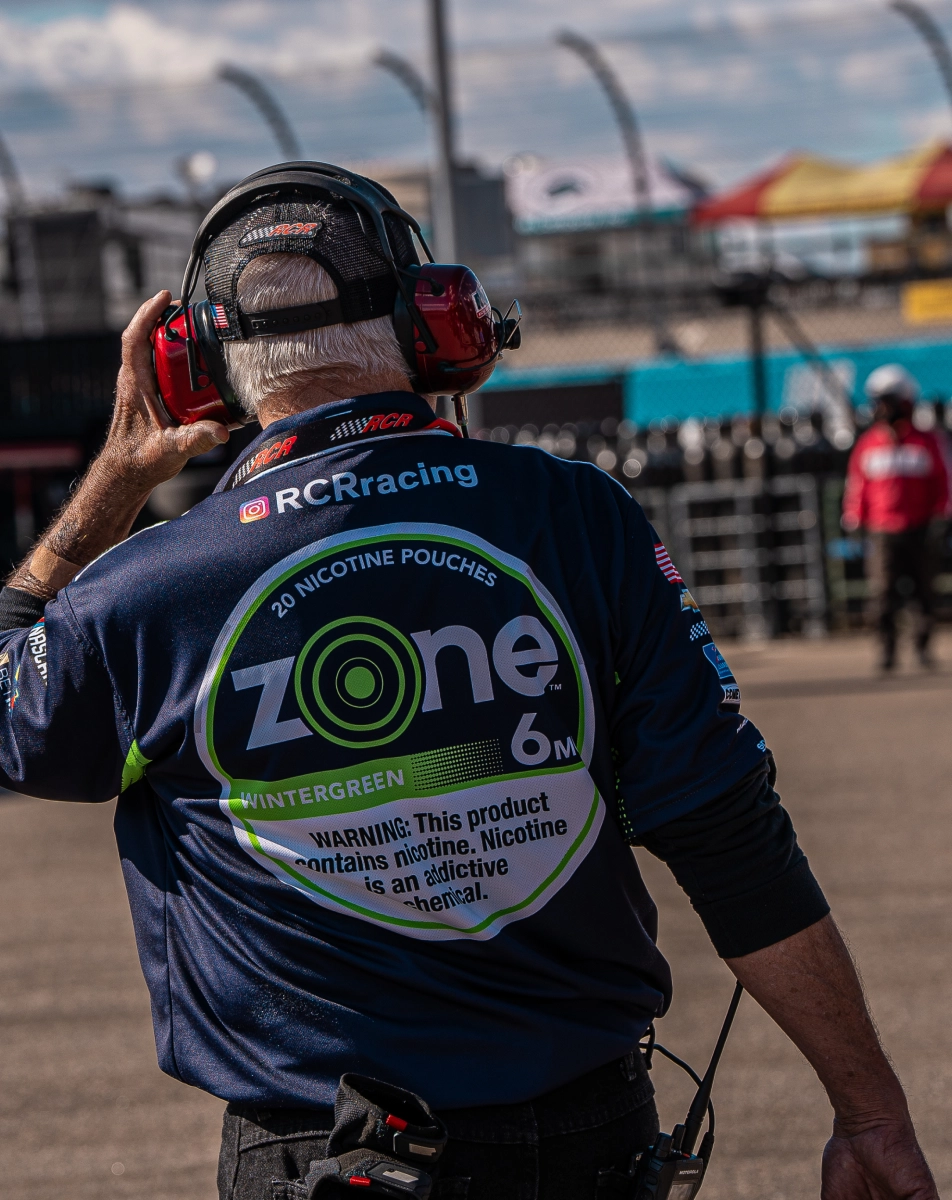 Zone Race Manager with headphones on